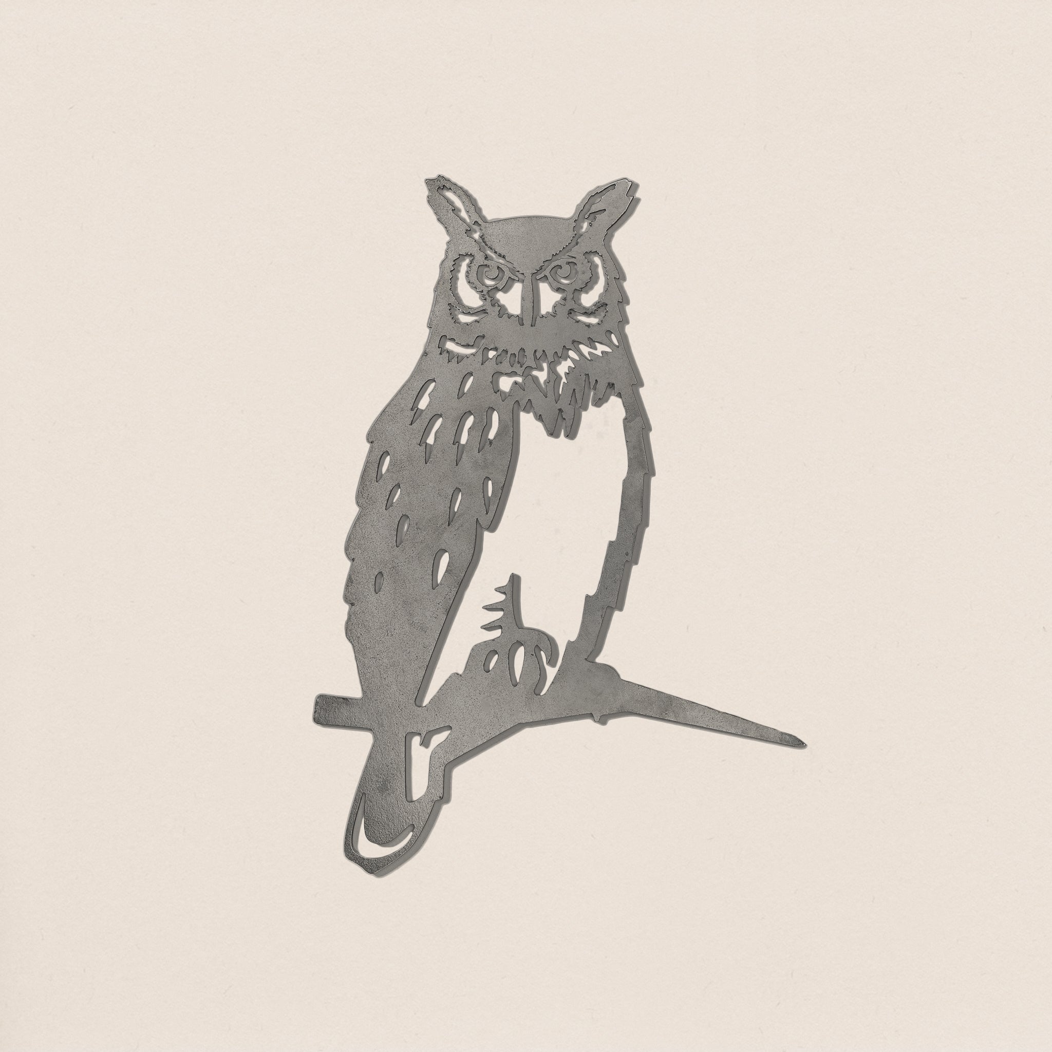 Great Horned Owl silhouette in raw Corten steel, crafted for easy outdoor installation as bold garden art or a unique memorial gift.