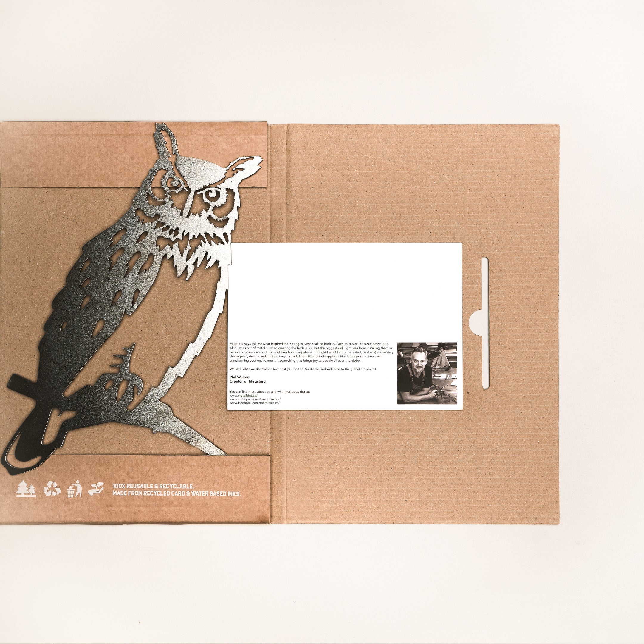 Great Horned Owl silhouette in Corten steel with recycled gift box and message card, a meaningful and eco-conscious gift option.