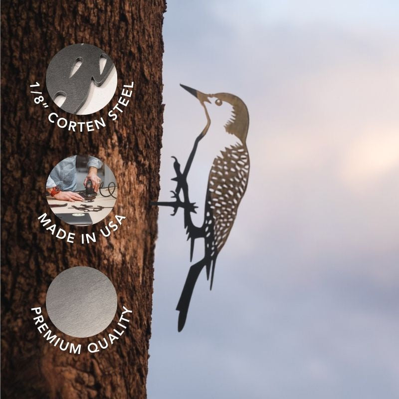 Woodpecker – A striking metal woodpecker silhouette on a tree trunk, accented by three circular labels: “1/8’’ corten steel,” “Made in USA,” and “Premium quality.” This premium Woodpecker sculpture doubles as unique garden decor, creating eye-catching corten steel yard art that stands out against the sky and clouds.