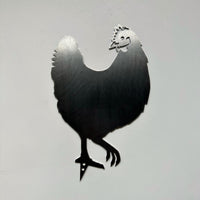 The Rhode Island Red is a metal silhouette cutout of the state bird, standing on one leg against a plain light gray background.