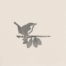 A metallic pencil engraving-style illustration of a wren perched on a leafy branch against a light background—ideal inspiration for corten steel yard art.