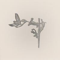 Hummingbird silhouette in raw Corten steel, ready for installation as outdoor bird sculpture and nature-inspired garden art.